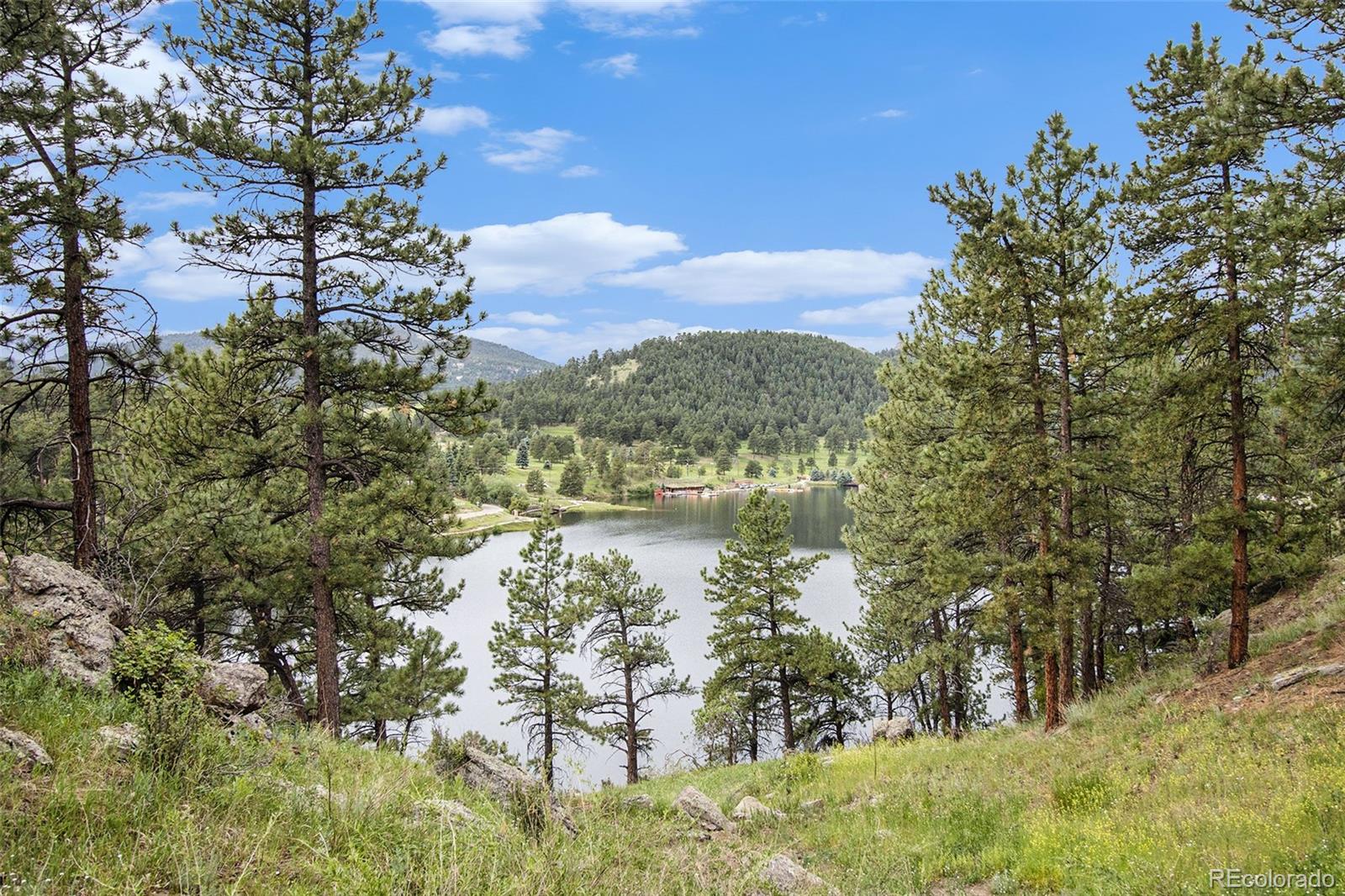 a view of lake with mountain