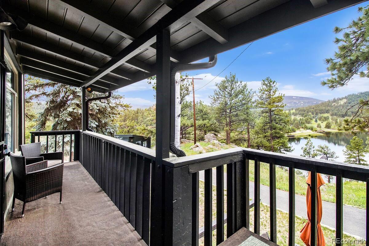 28433 Kinnikinnick Road Evergreen, CO 80439 - Photo 15 of 29 a view of balcony with furniture