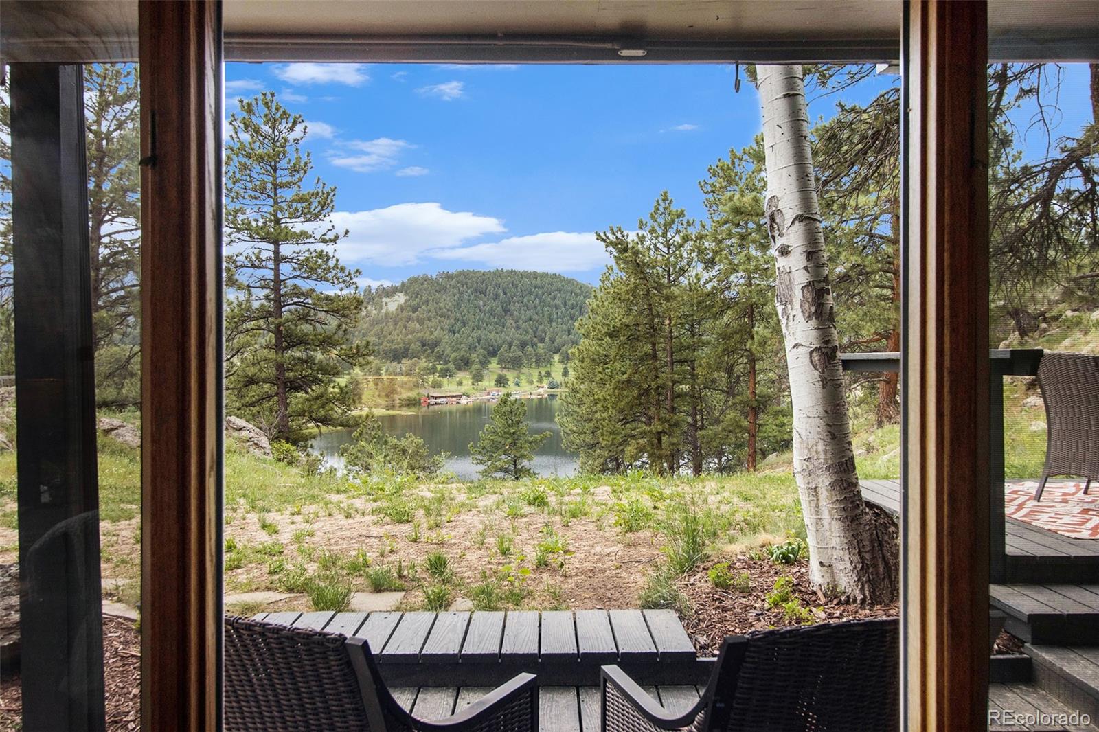 28433 Kinnikinnick Road Evergreen, CO 80439 - Photo 8 of 29 a view of a from a window