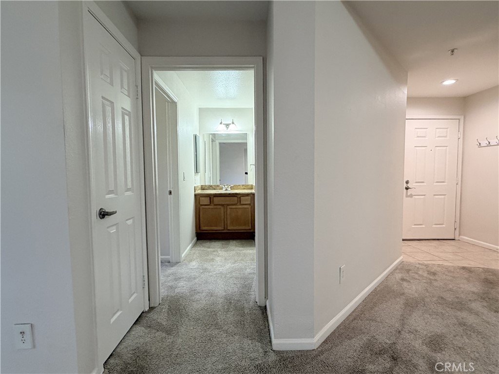 375 Central Avenue, Unit 14 Riverside, CA 92507 - Photo 12 of 32 a view of a hallway to a livingroom and a livingroom