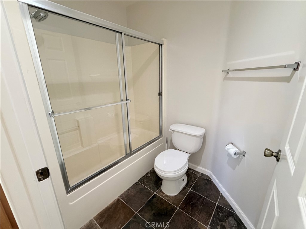 375 Central Avenue, Unit 14 Riverside, CA 92507 - Photo 14 of 32 a bathroom with a toilet and a shower