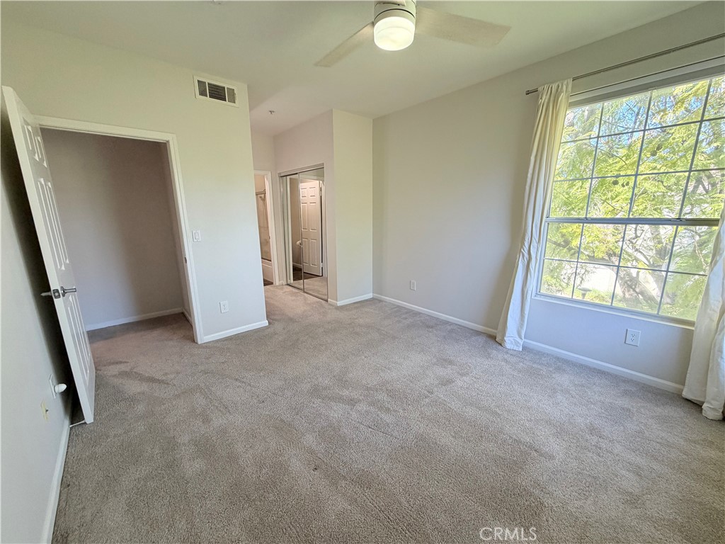 375 Central Avenue, Unit 14 Riverside, CA 92507 - Photo 18 of 32 a view of an empty room with a window