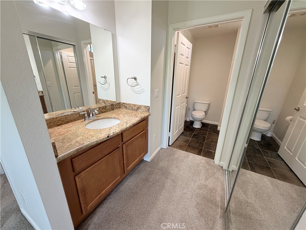 375 Central Avenue, Unit 14 Riverside, CA 92507 - Photo 20 of 32 a bathroom with a sink and a mirror