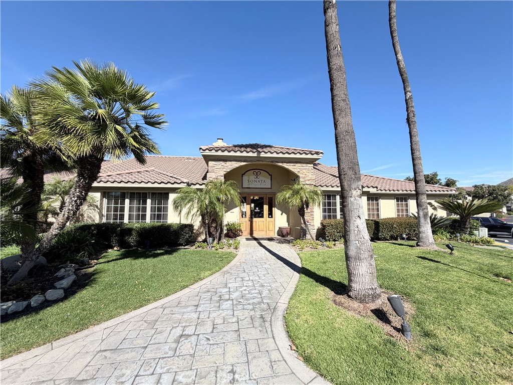 375 Central Avenue, Unit 14 Riverside, CA 92507 - Photo 24 of 32 a view of a house with a backyard