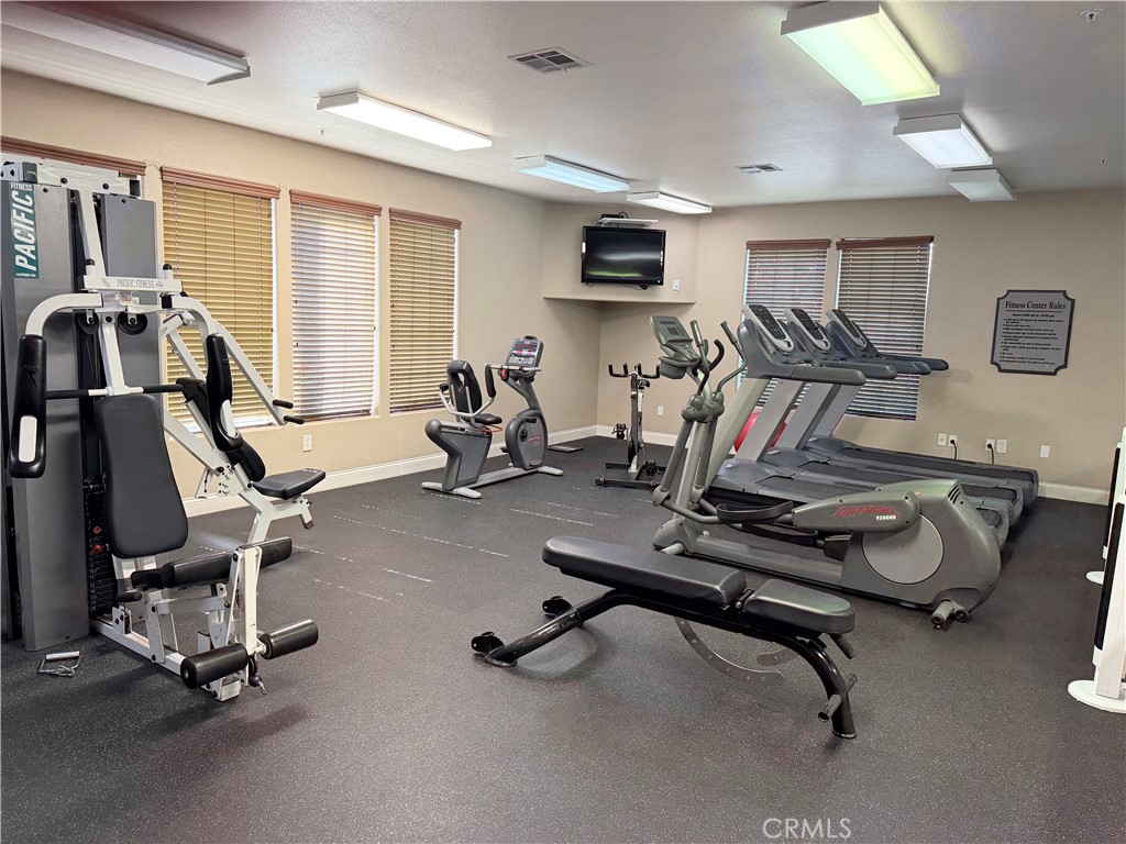 375 Central Avenue, Unit 14 Riverside, CA 92507 - Photo 25 of 32 a view of a room with gym equipment