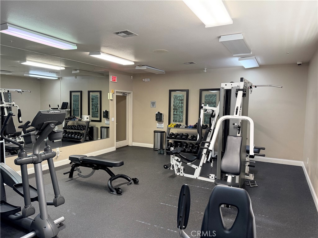 375 Central Avenue, Unit 14 Riverside, CA 92507 - Photo 26 of 32 a view of a room with gym equipment