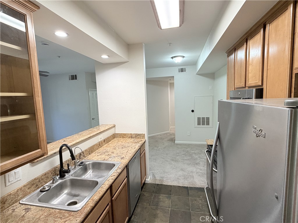 375 Central Avenue, Unit 14 Riverside, CA 92507 - Photo 7 of 32 a bathroom with a sink double vanity and shower