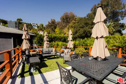 an outdoor space with furniture