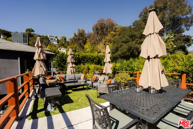 an outdoor space with furniture