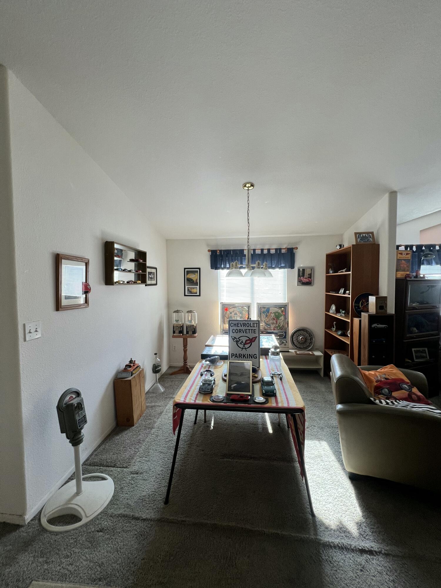 4722 Maple Trail Redding, CA 96003 - Photo 9 of 14 a room with furniture a air conditioner and a window