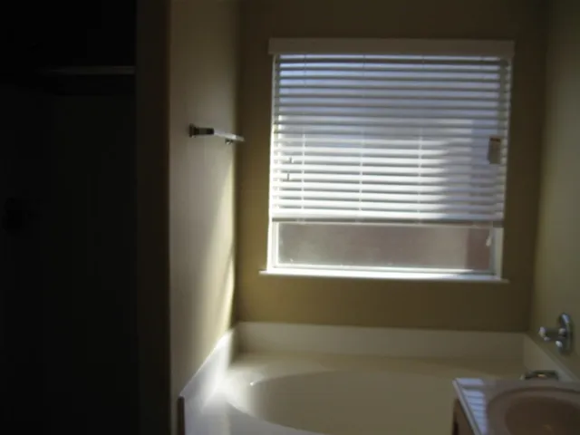a view of a bathtub in a room