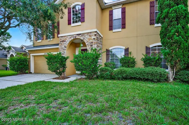 a bathroom with a sink toilet and a mirror