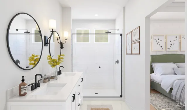 a bathroom with a sink mirror and a mirror