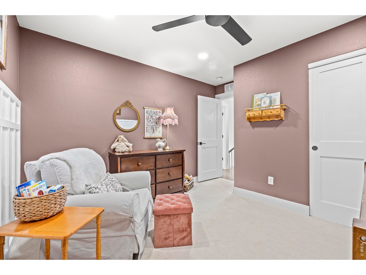 148 Summit Way Erie, CO 80516 - Photo 28 of 47 a bedroom with furniture and wooden floor