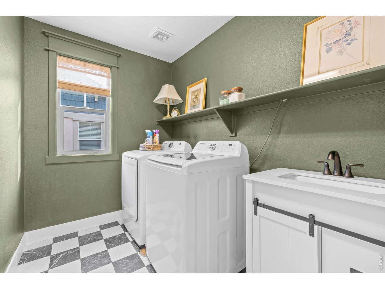 148 Summit Way Erie, CO 80516 - Photo 32 of 47 a utility room with a sink dryer and washer