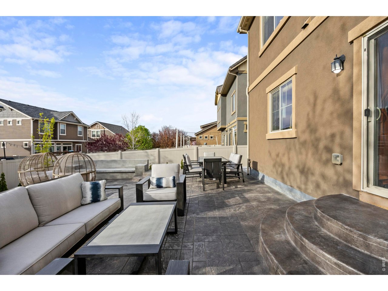 148 Summit Way Erie, CO 80516 - Photo 35 of 47 a view of a terrace with furniture and a terrace
