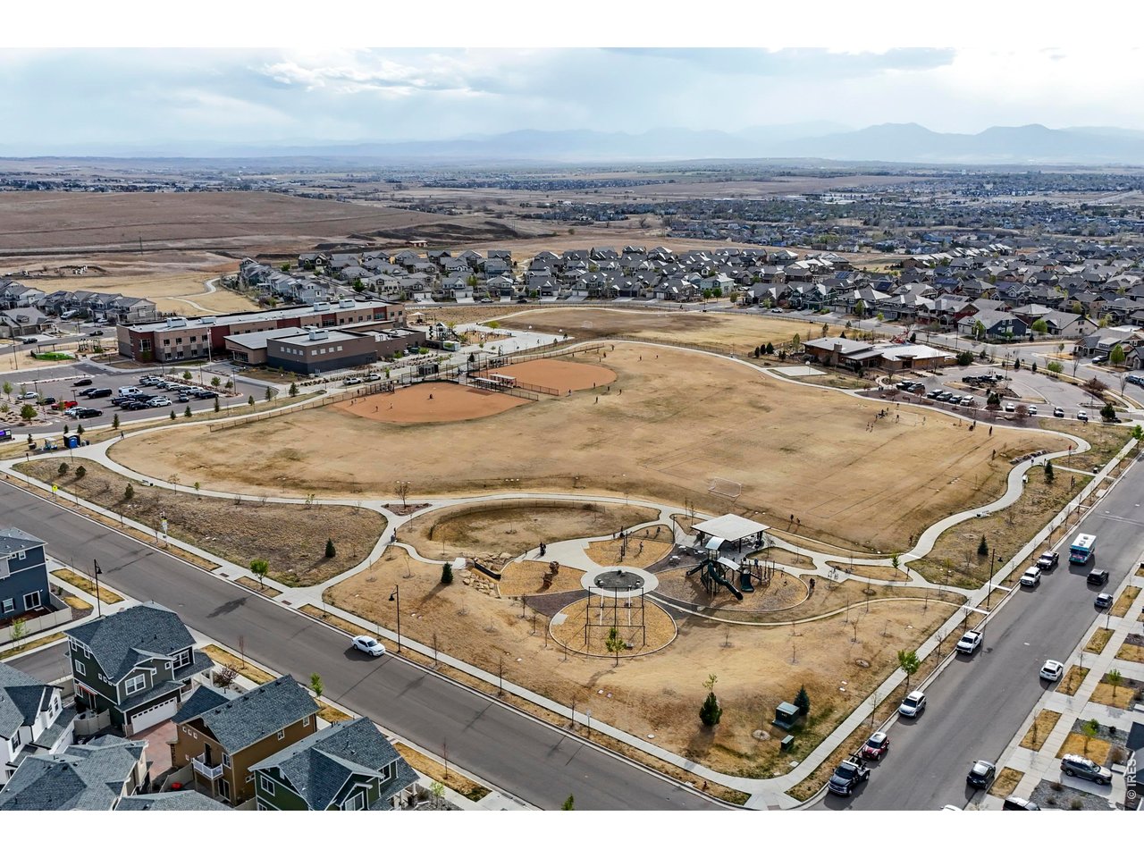 148 Summit Way Erie, CO 80516 - Photo 43 of 47 an aerial view of residential houses with outdoor space