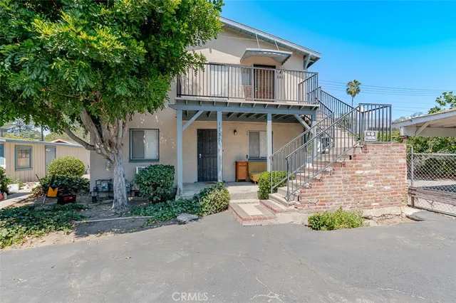 a kitchen with a refrigerator stove and sink