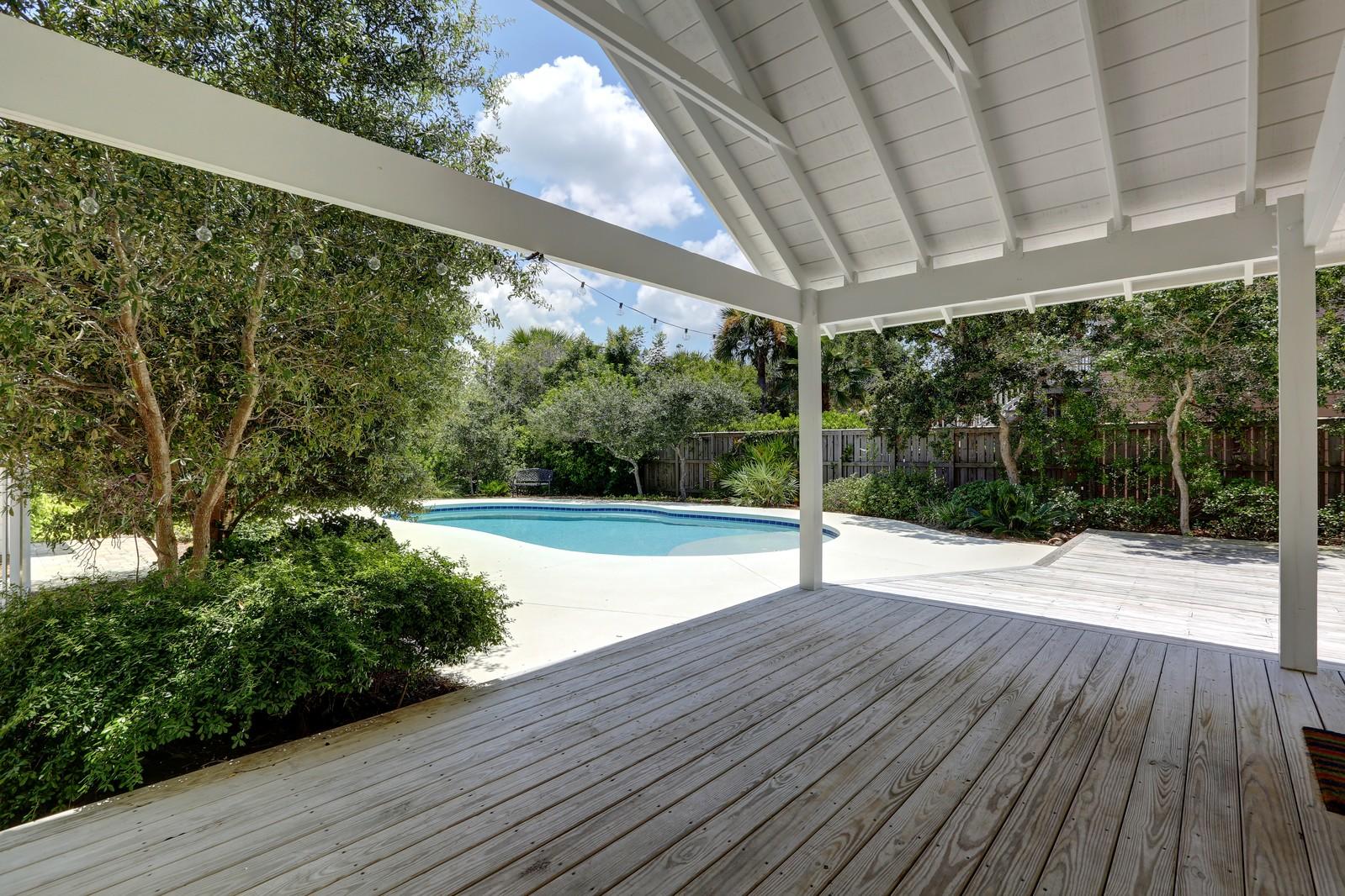 97 Sand Dunes Road Santa Rosa Beach, FL 32459 - Photo 12 of 31 a view of a swimming pool with a porch