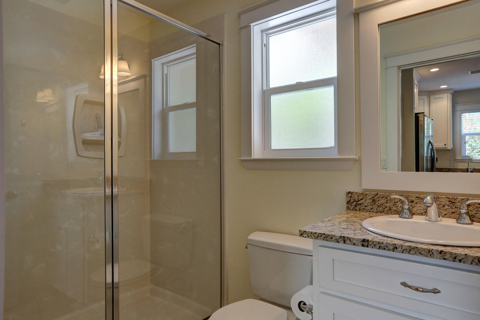 97 Sand Dunes Road Santa Rosa Beach, FL 32459 - Photo 21 of 31 a bathroom with a granite countertop sink toilet a mirror and shower