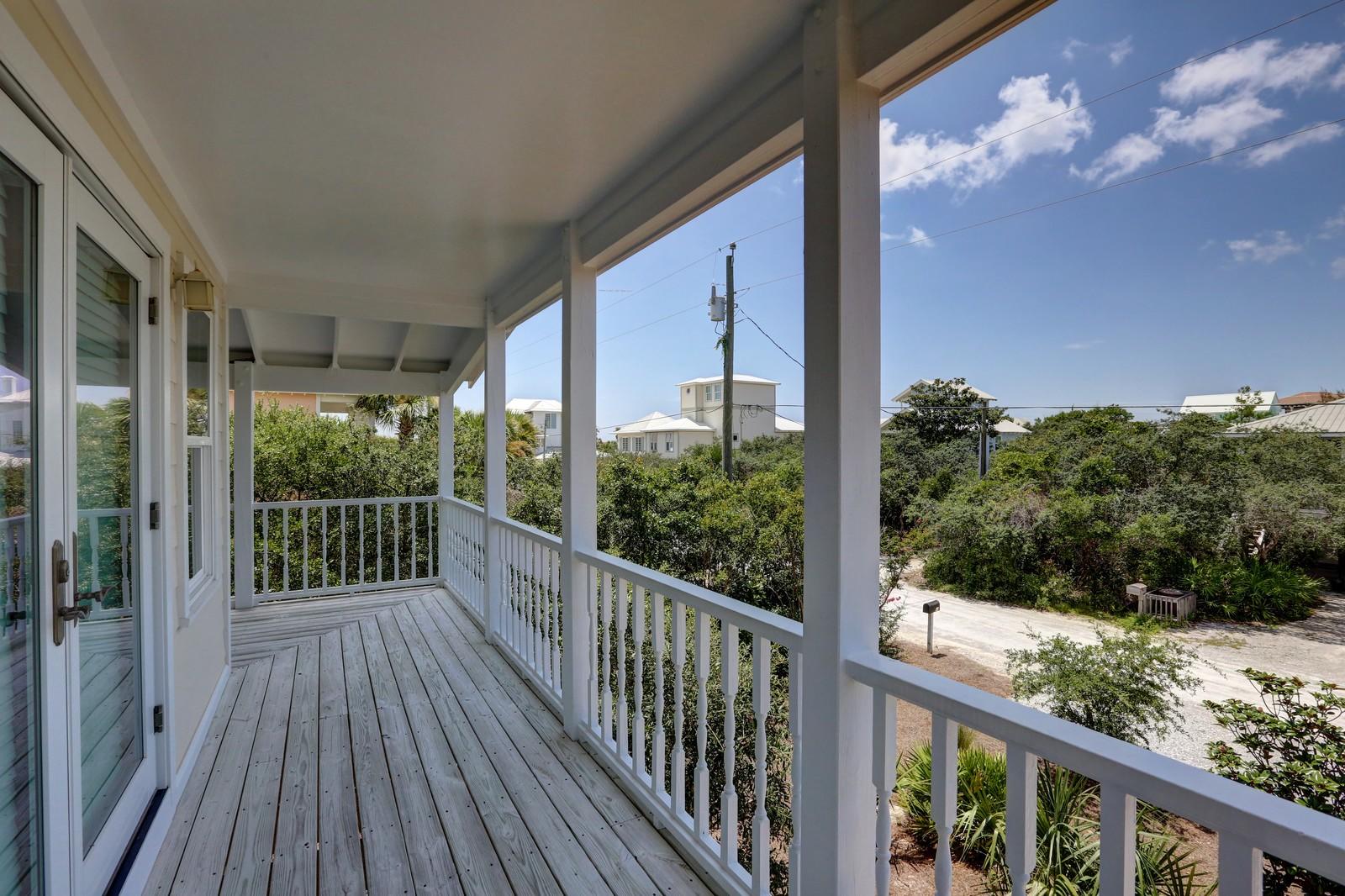 97 Sand Dunes Road Santa Rosa Beach, FL 32459 - Photo 24 of 31 a view of a balcony with wooden floor