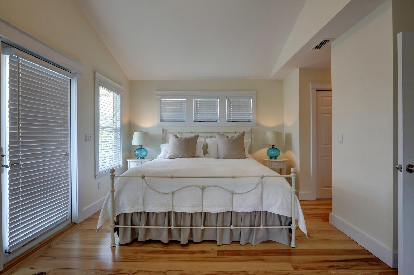 97 Sand Dunes Road Santa Rosa Beach, FL 32459 - Photo 25 of 31 a bedroom with a bed and window