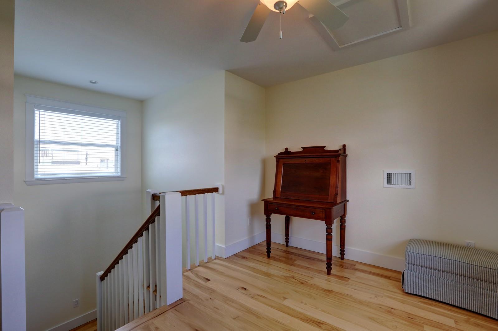 97 Sand Dunes Road Santa Rosa Beach, FL 32459 - Photo 31 of 31 a view of room with stairs and wooden floor