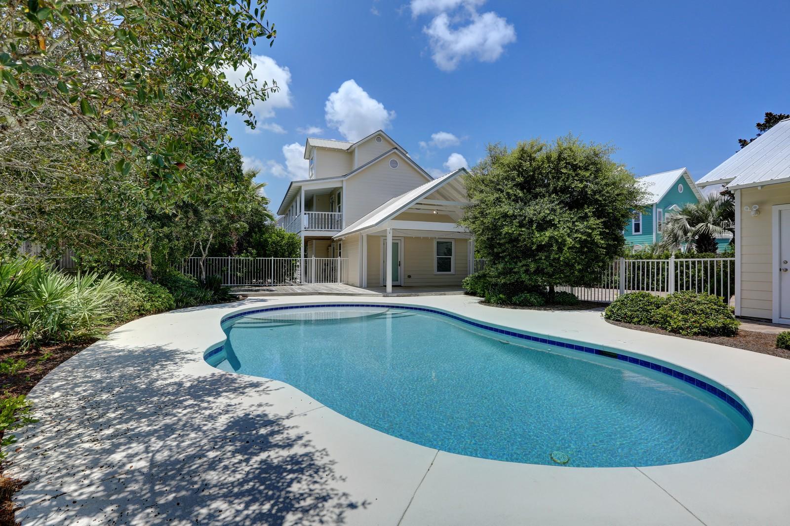 97 Sand Dunes Road Santa Rosa Beach, FL 32459 - Photo 9 of 31 a view of a house with swimming pool yard and patio