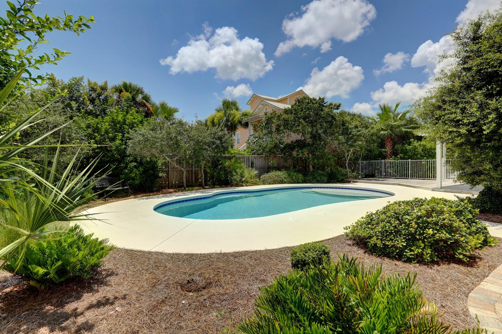97 Sand Dunes Road Santa Rosa Beach, FL 32459 - Photo 10 of 31 a view of a swimming pool with a yard
