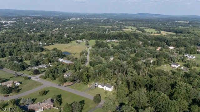 an aerial view of a city with lots of residential buildings