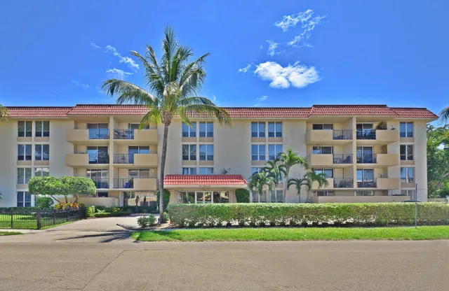 a view of a building with a garden