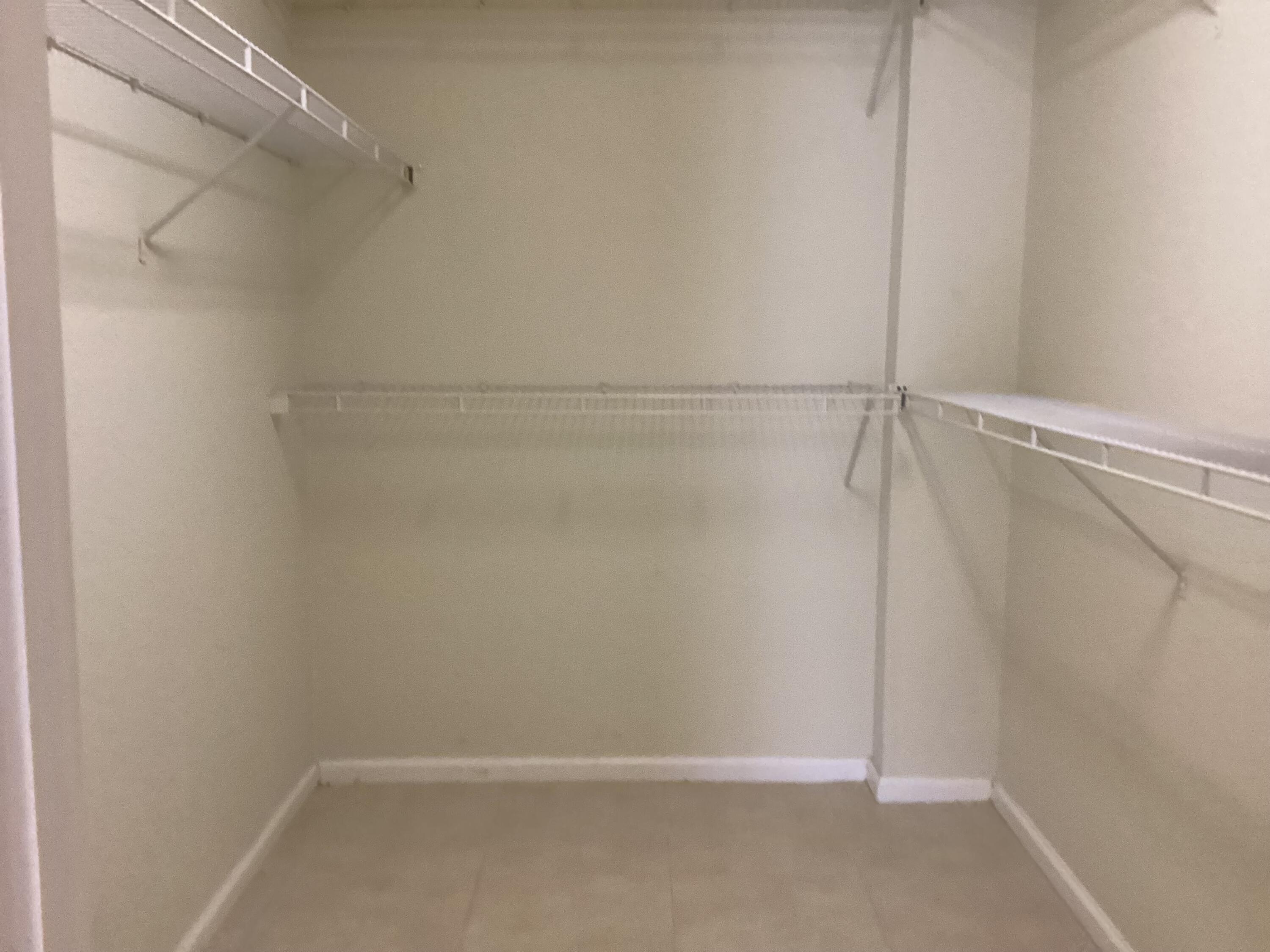 1000 Spanish River Road, Unit 3K Boca Raton, FL 33432 - Photo 16 of 32 a view of an empty walk in closet