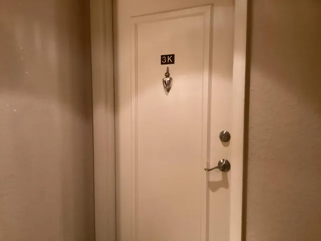 a kitchen with granite countertop cabinets stainless steel appliances and a sink