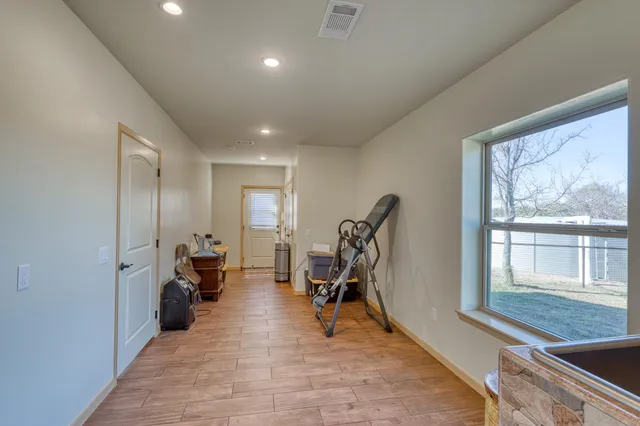 a view of a room with gym equipment