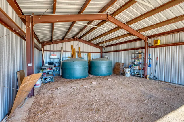 a view of room with furniture and a chandelier
