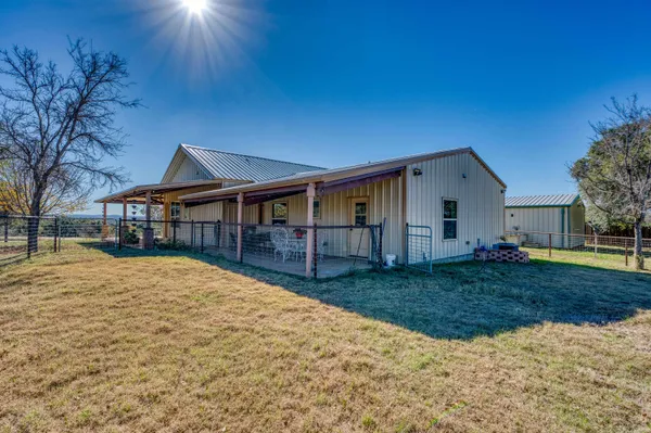 a view of a yard in front of house