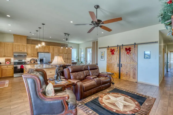 a living room with furniture and a rug