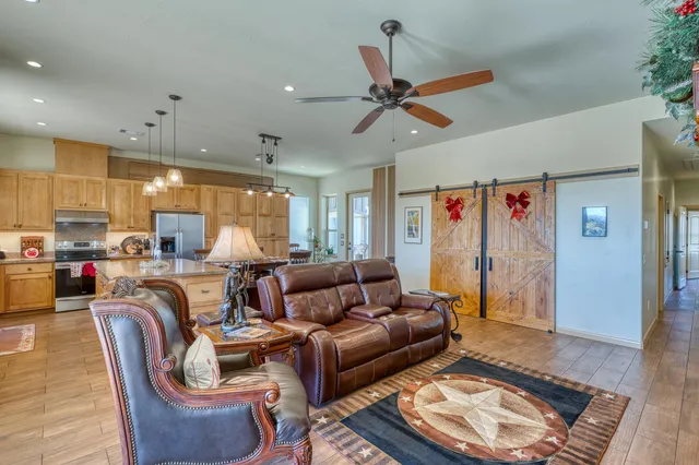 a living room with furniture and a rug