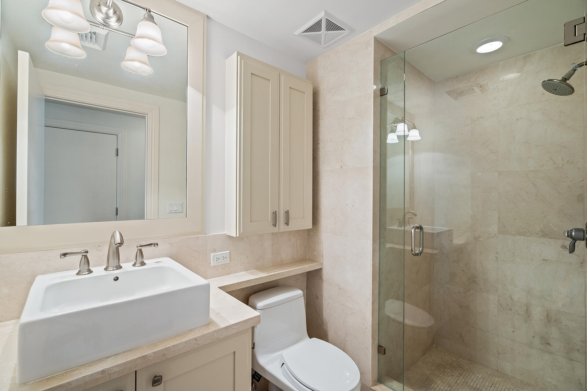 455 East Palmetto Park Road, Unit 3W Boca Raton, FL 33432 - Photo 19 of 40 a bathroom with a sink toilet and shower