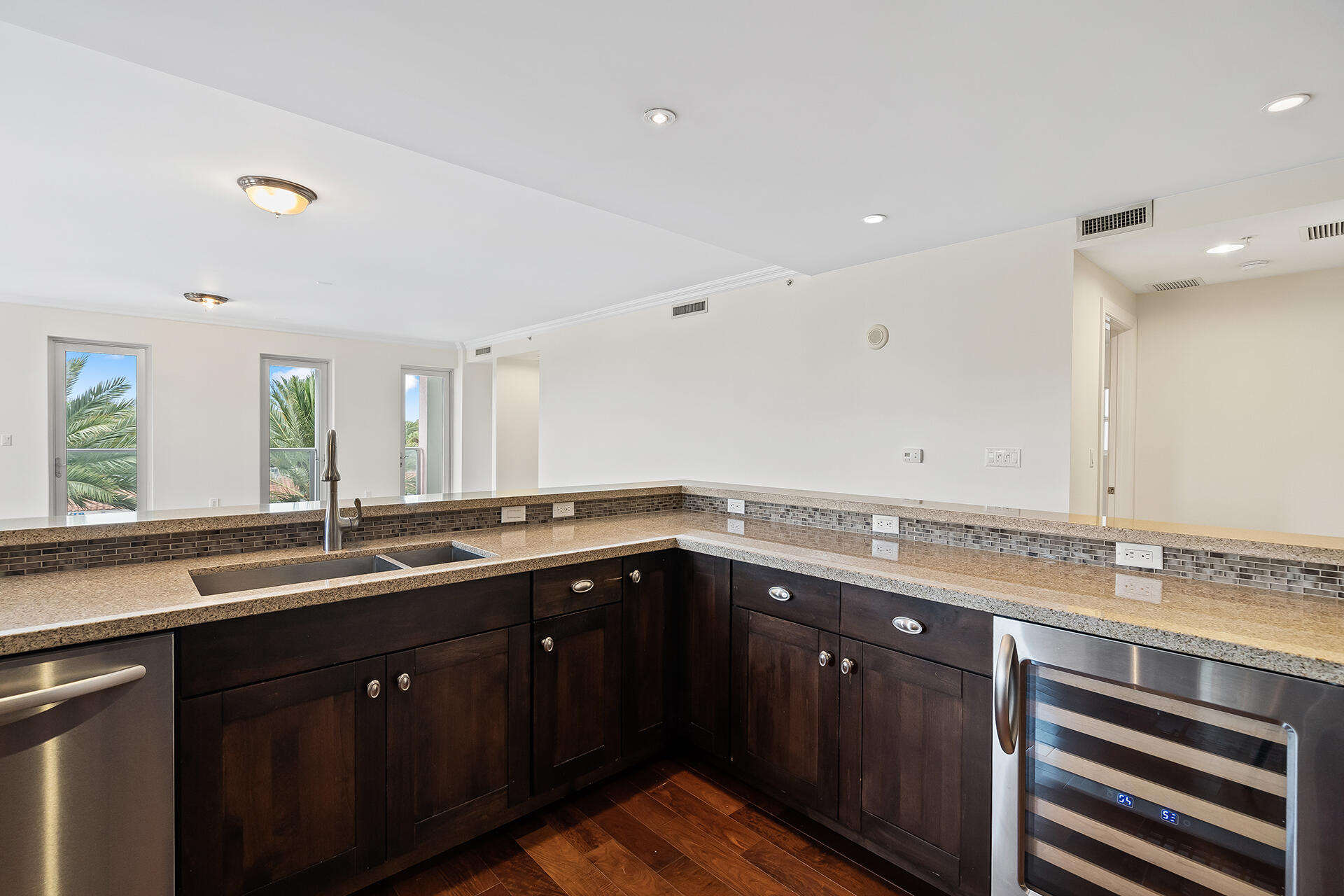 455 East Palmetto Park Road, Unit 3W Boca Raton, FL 33432 - Photo 6 of 40 a kitchen with a sink and cabinets