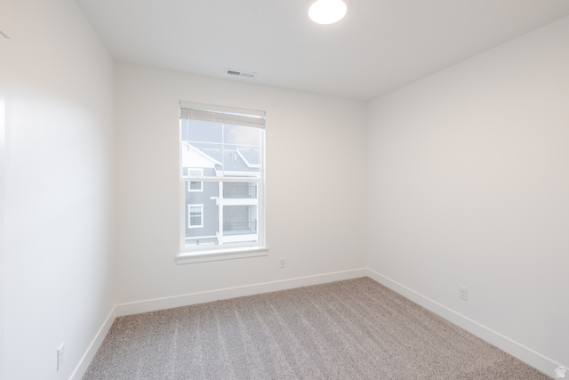 4661 Poplar Way, Unit R303 Mapleton, UT 84664 - Photo 5 of 17 Unfurnished room with light carpet and baseboards