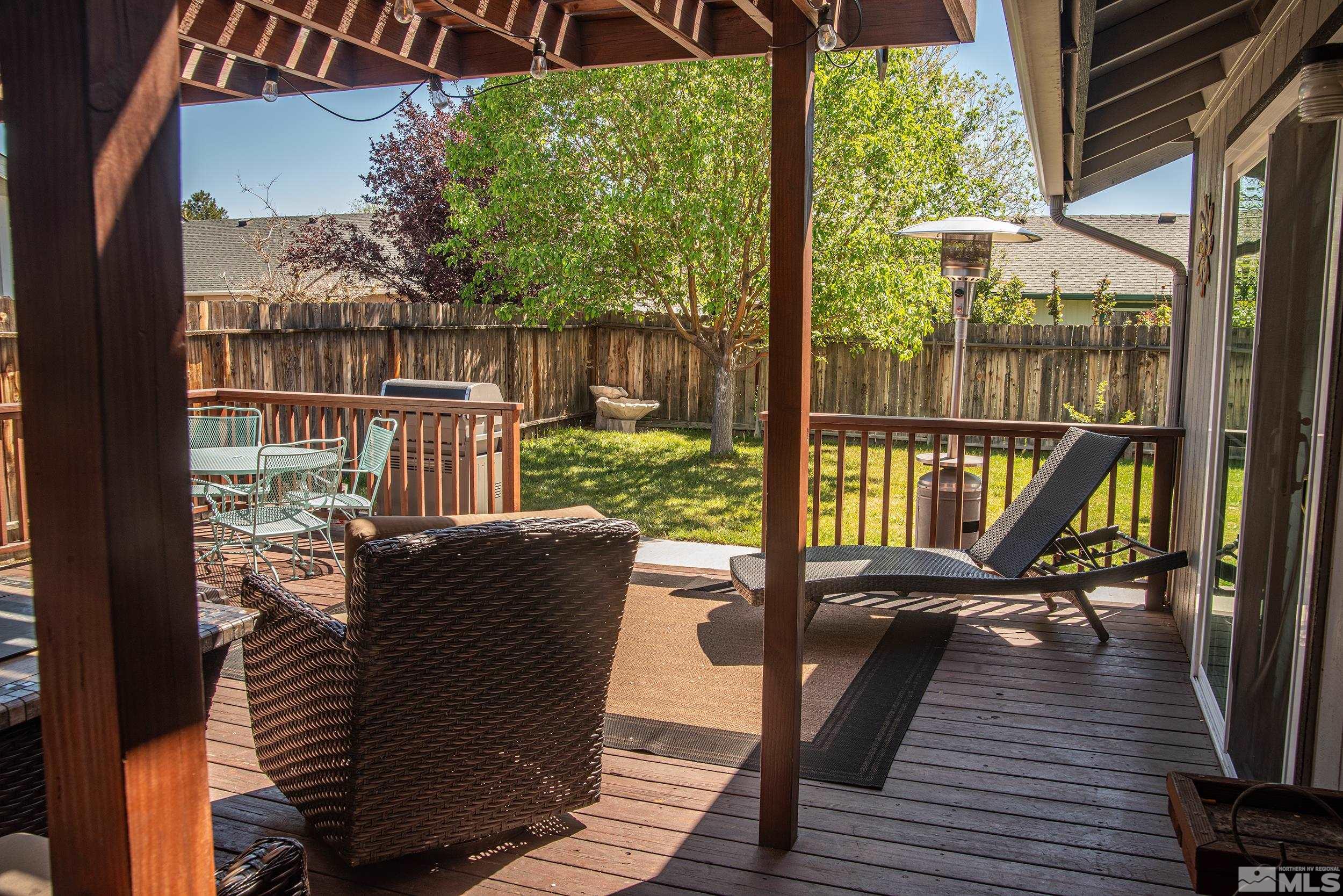 2525 Ridgecrest Drive Carson City, NV 89706 - Photo 13 of 21 a view of balcony with couch and wooden floor