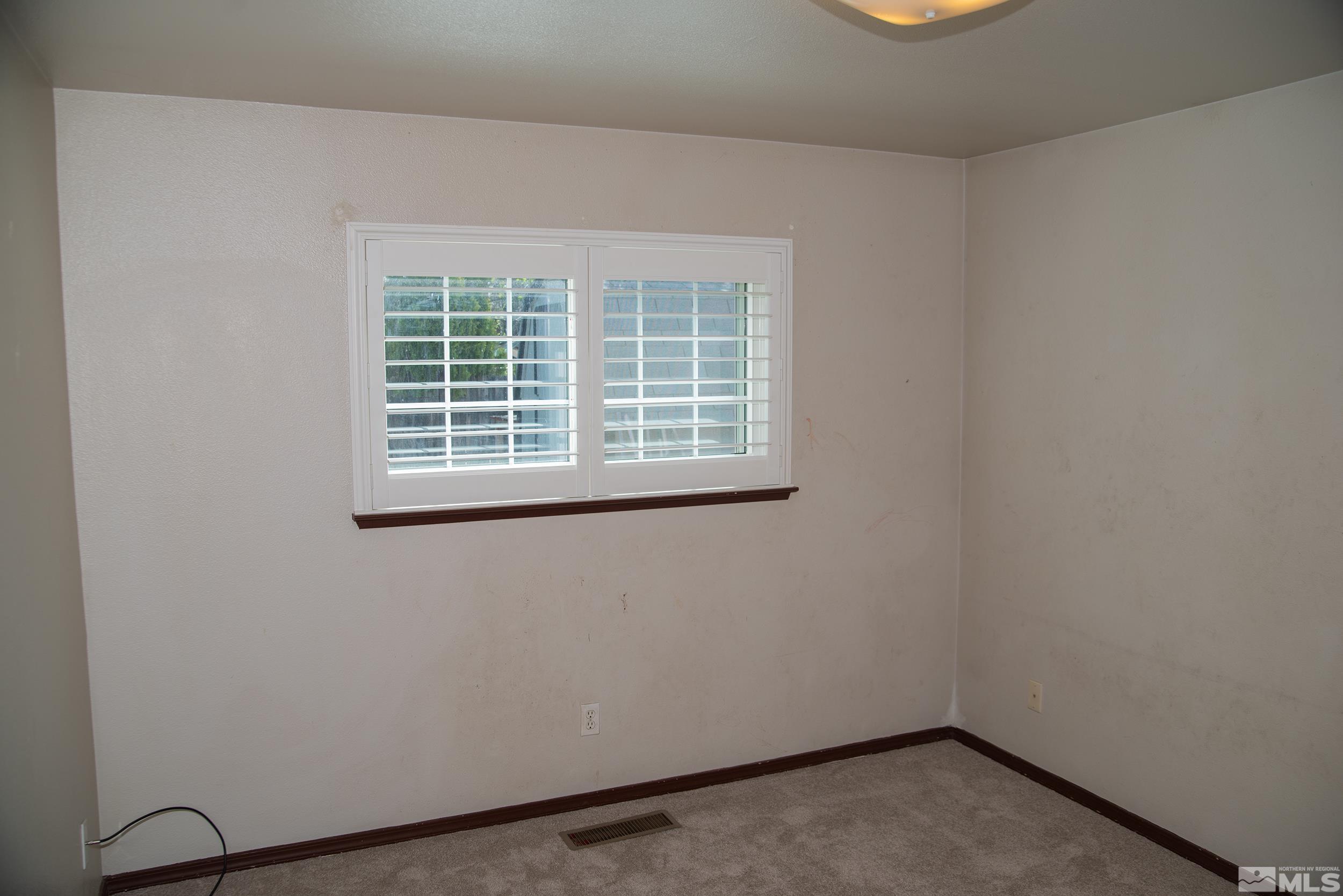 2525 Ridgecrest Drive Carson City, NV 89706 - Photo 20 of 21 a view of a small space with a window