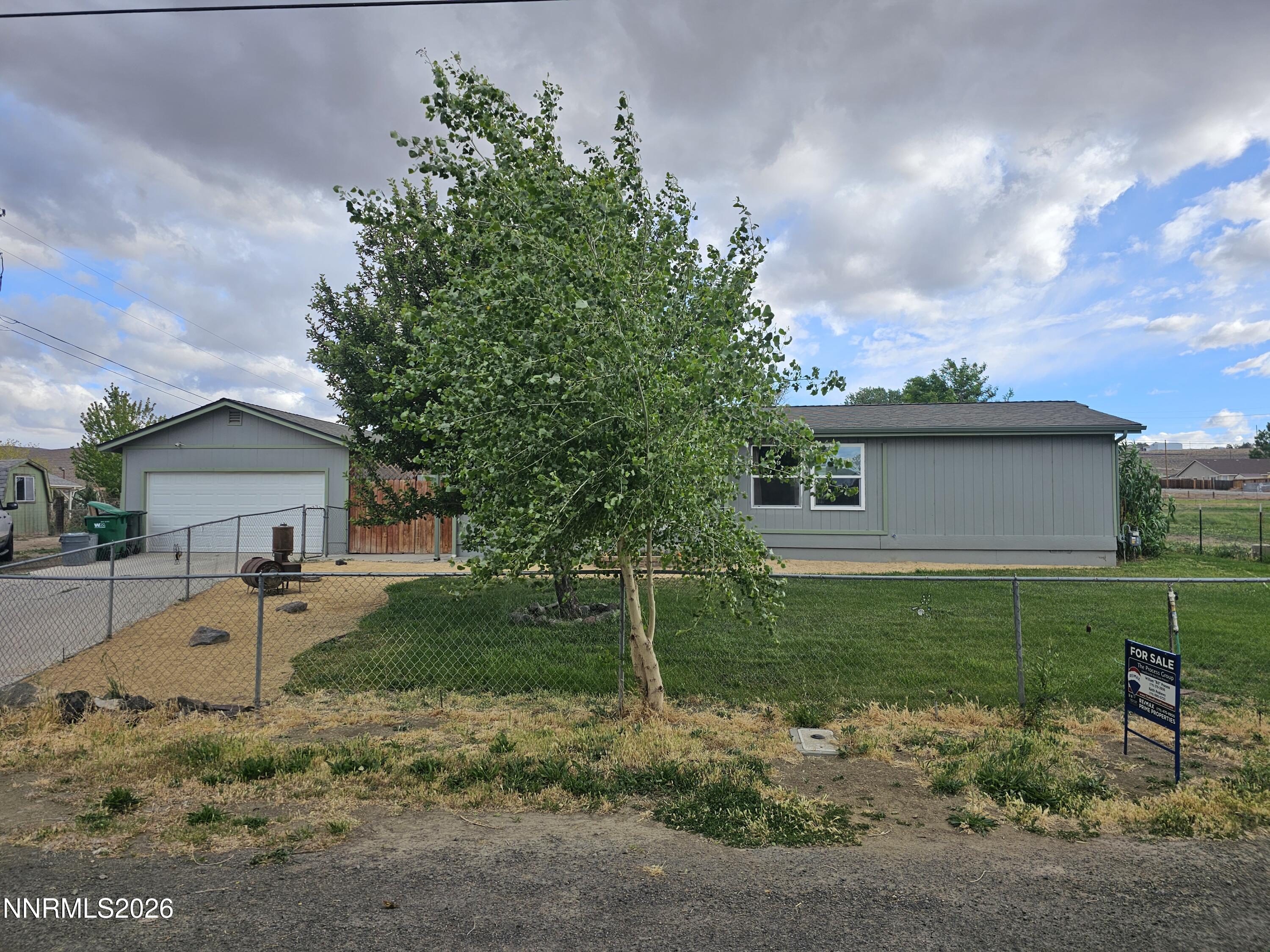 1125 Rancho Road Fernley, NV 89408 - Photo 29 of 47 a view of a house with a yard
