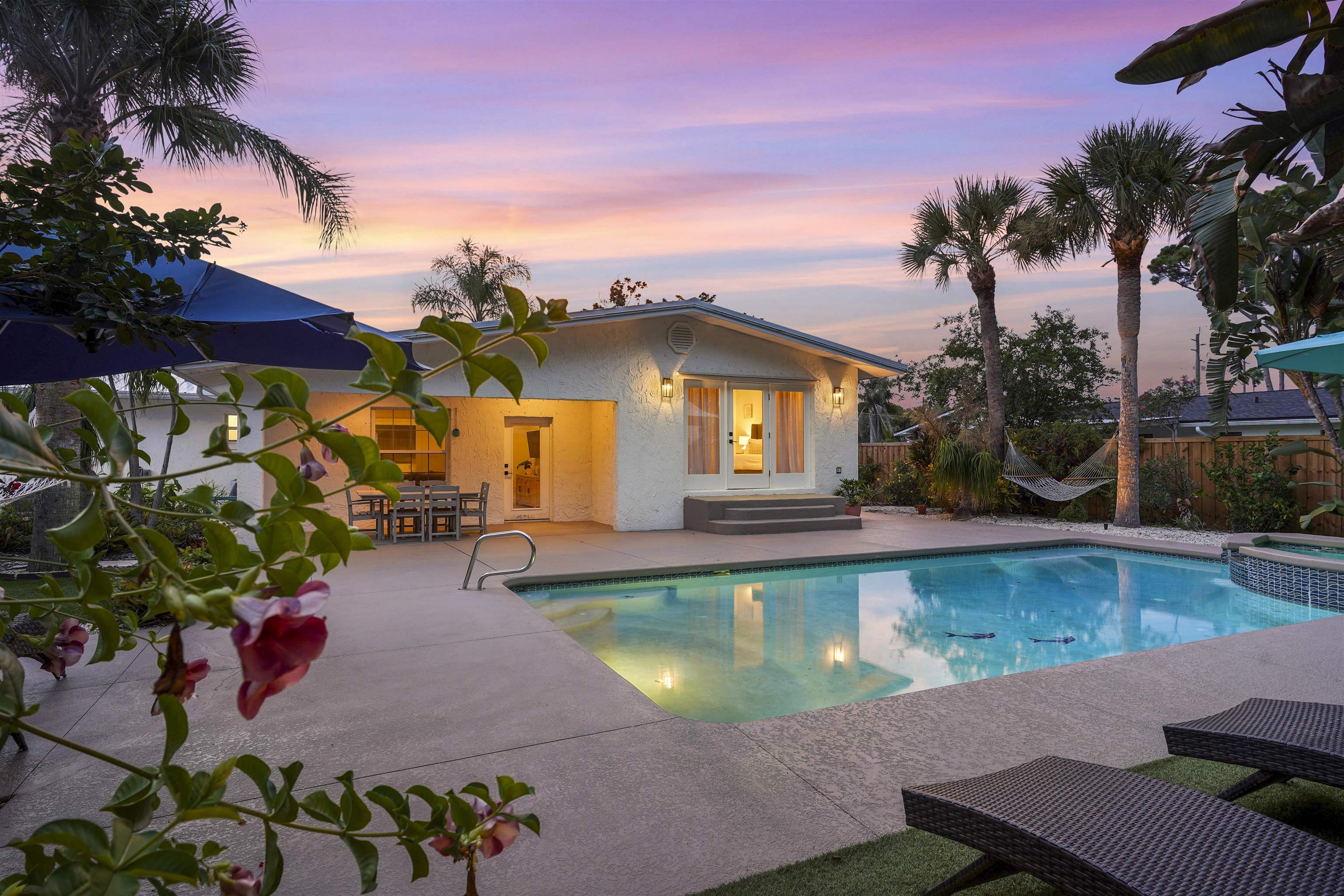 5436 4th Street St. Augustine, FL 32080 - Photo 2 of 45 a view of a swimming pool with a patio