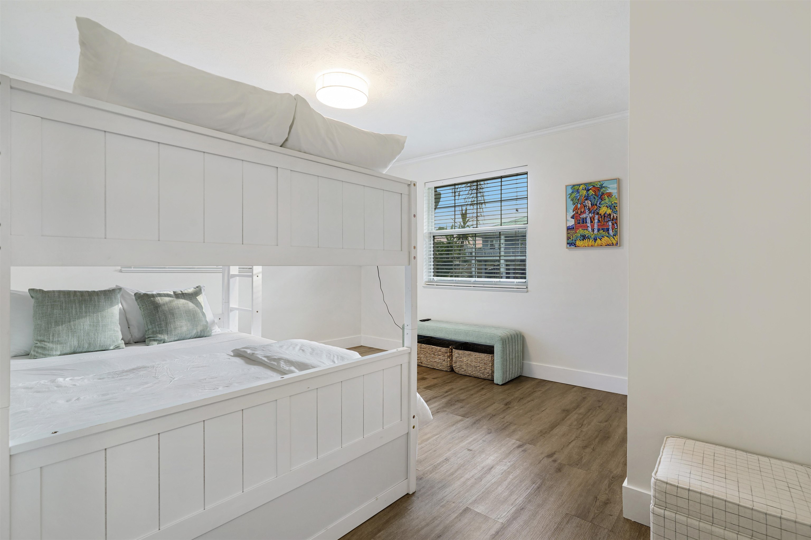 5436 4th Street St. Augustine, FL 32080 - Photo 26 of 45 a bedroom with a bed and wooden floor