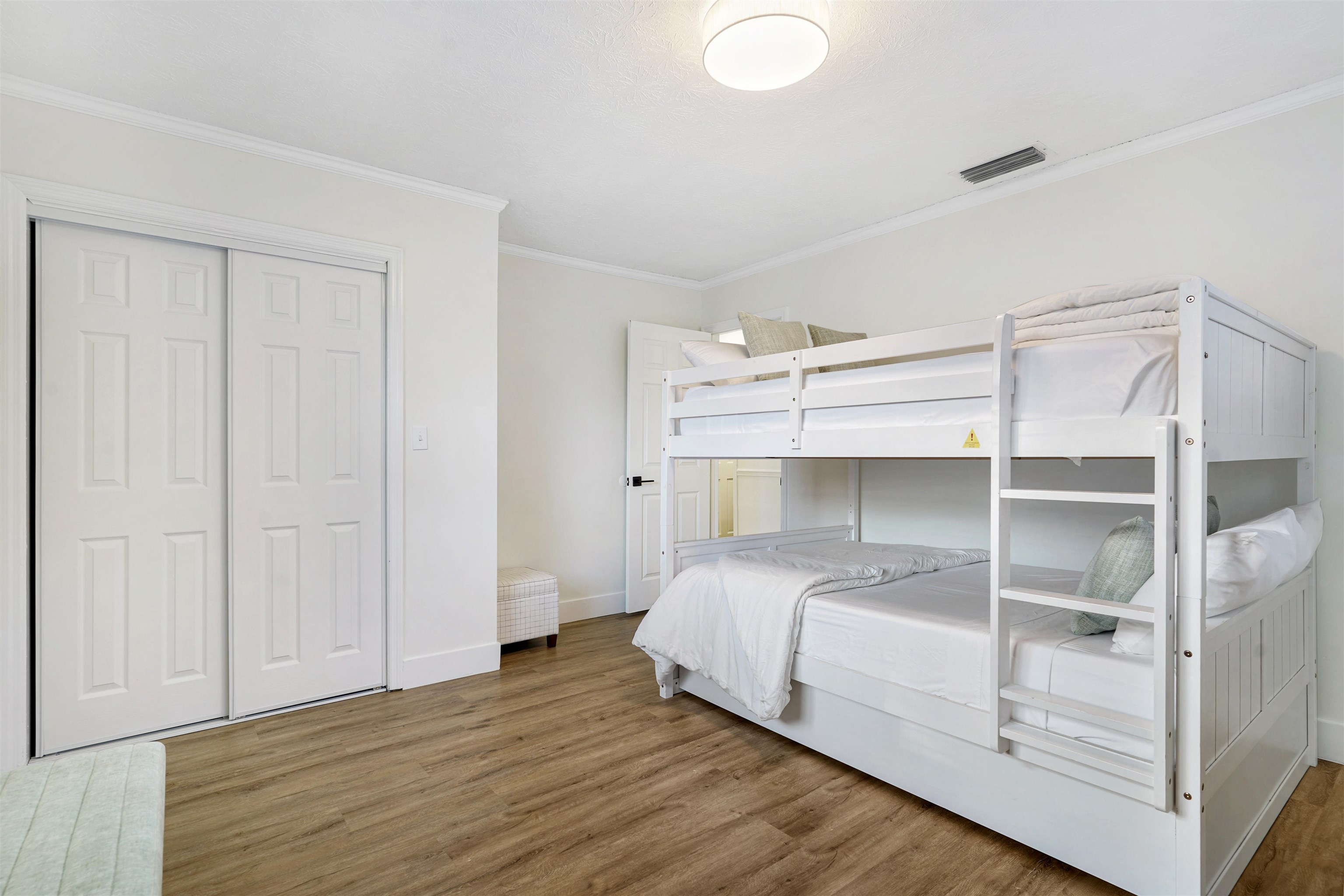 5436 4th Street St. Augustine, FL 32080 - Photo 27 of 45 a bedroom with a bed and a closet