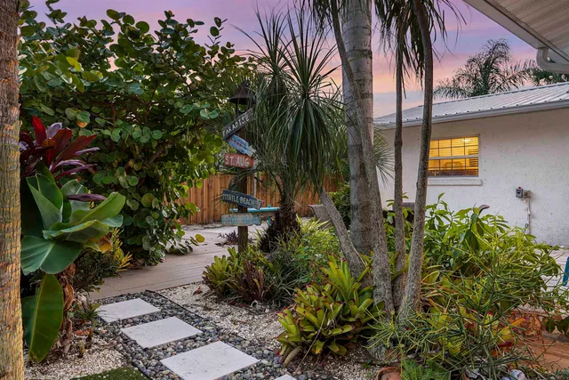 a view of a backyard of a house
