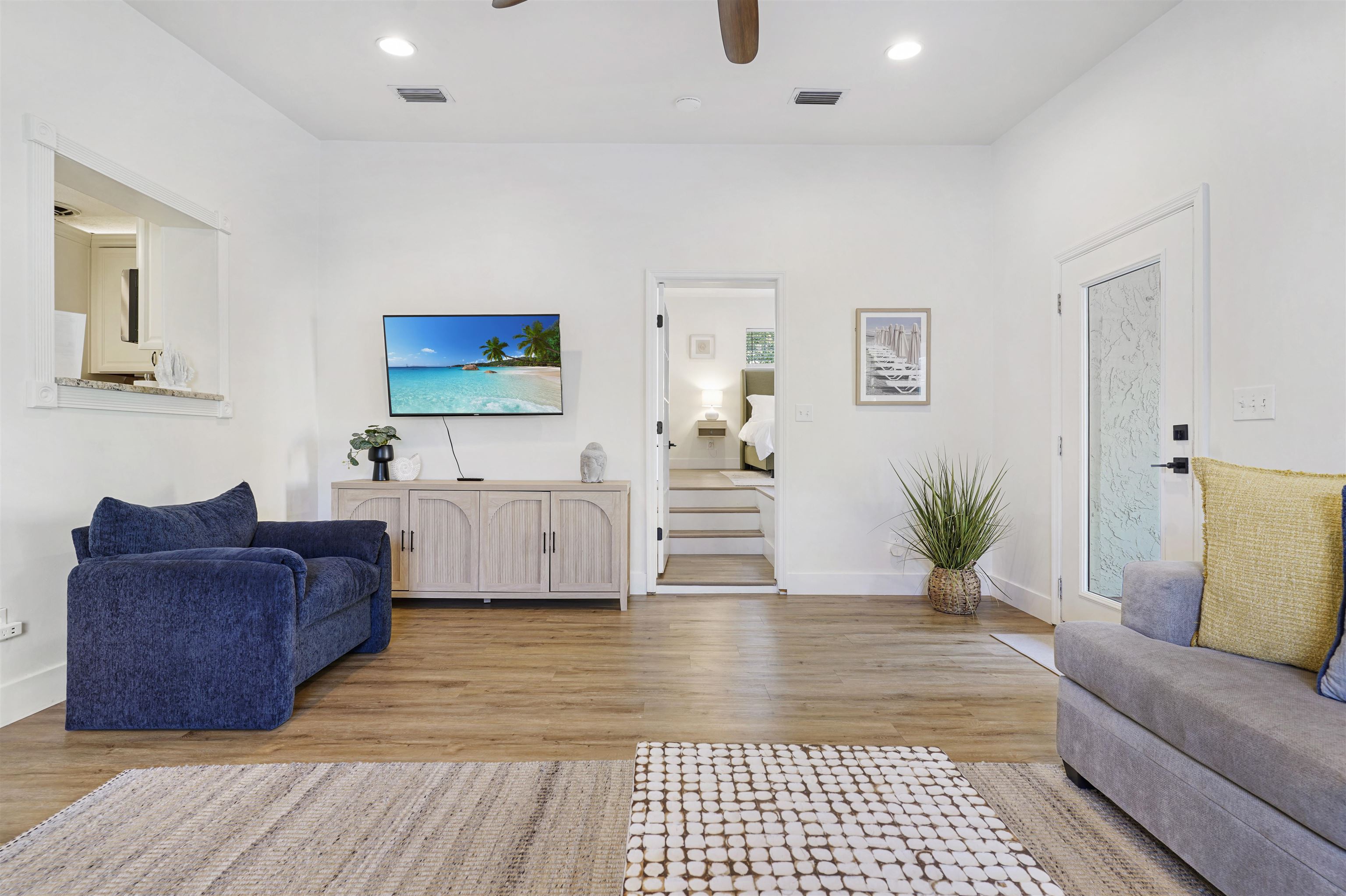5436 4th Street St. Augustine, FL 32080 - Photo 10 of 45 a living room with furniture and a flat screen tv