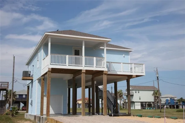 a front view of building with yard